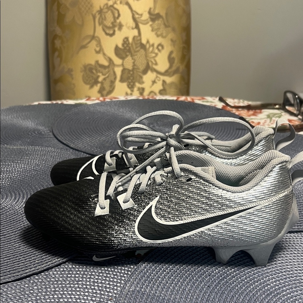 Nike men’s vapor edge Black and Silver football cleats